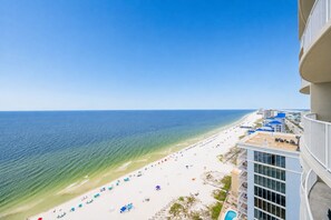 A high-rise hotel with a view of a beach and the ocean. - Phoenix Gulf Shores Ii 2303 3 Bedroom Condo (Gulf Shores)