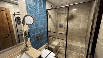 Shower, hair dryer, slippers, towels