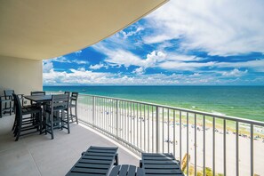 Outdoor dining - New Beachfront Condo! Family Fun in Gulf Shores – PGS2 1402 (Gulf Shores)