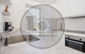 Fridge, dishwasher, coffee/tea maker