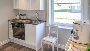 Kylskåp, ugn, spishäll och diskmaskin