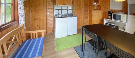 Fridge, microwave, stovetop, coffee/tea maker