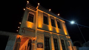 A two-story building with a sign reading 'Ekoton Cave House No.5' at the entrance. - Ekoton Cave Hotel (Nevsehir)