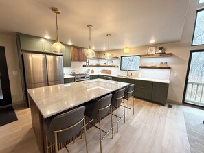 Fridge, microwave, oven, stovetop - Completely Renovated 6 Bedroom/6.5 bathroom with Indoor Pool, Hot Tub & Sauna (Hager City)