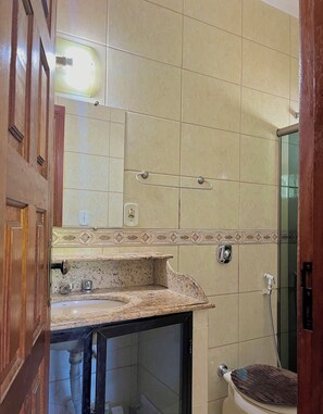 Shower, hair dryer, towels, soap