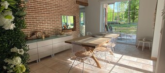 In Chardonnerets, garden level in a wooded setting 20 min from Pairi Daiza