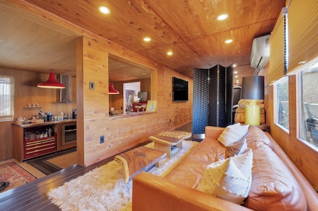Living area. The Nest: Luxury 1-bed w/ clawfoot tub, outdoor shower & AC in Bombay Beach