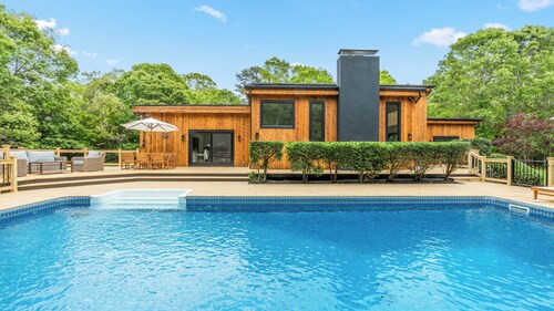 Chic Hampton Bays escape with private pool, expansive sundeck, and seamless...