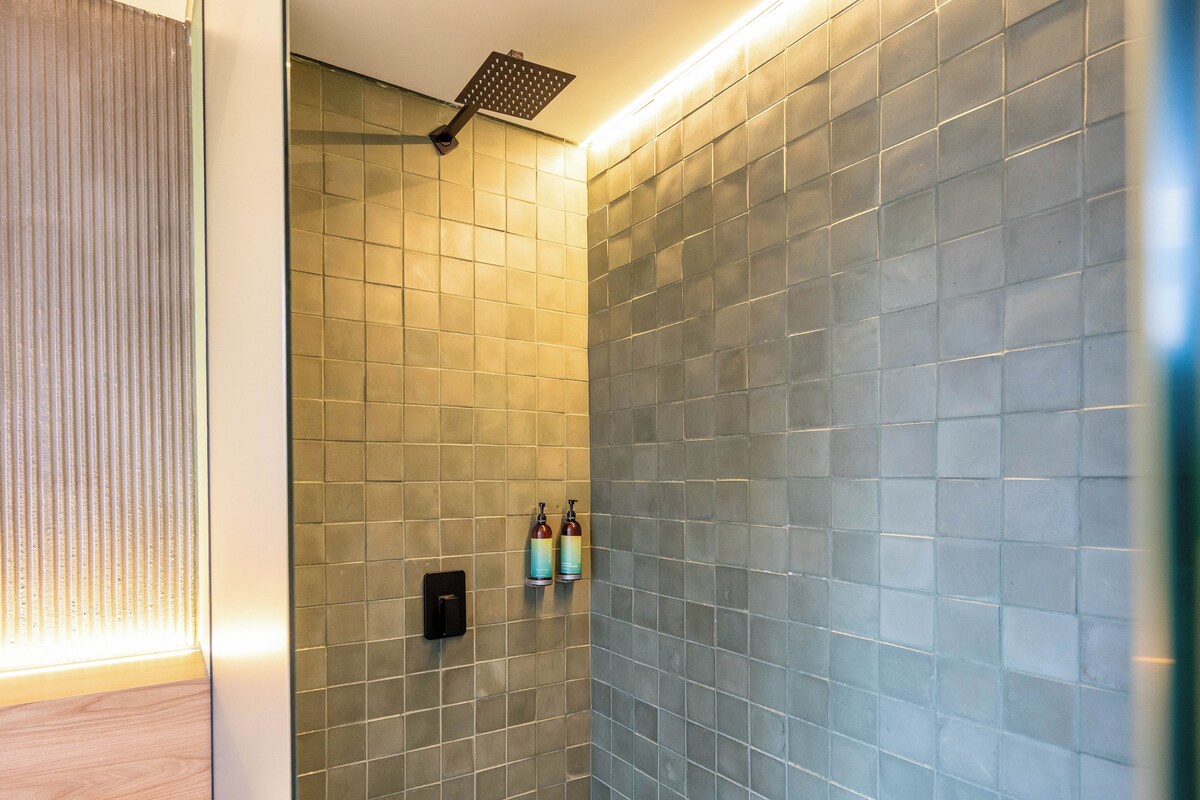 Bathroom | Shower, hair dryer, towels, soap