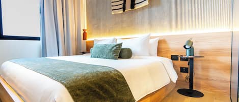 Chambre Double Deluxe | Coffres-forts dans les chambres, rideaux occultants