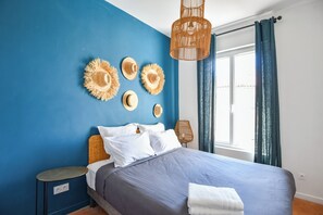 2 slaapkamers, een strijkplank/strijkijzer, beddengoed