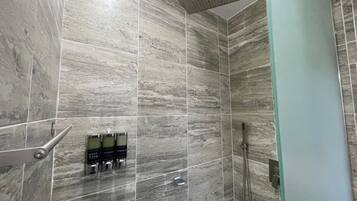 Shower, towels, soap, toilet paper