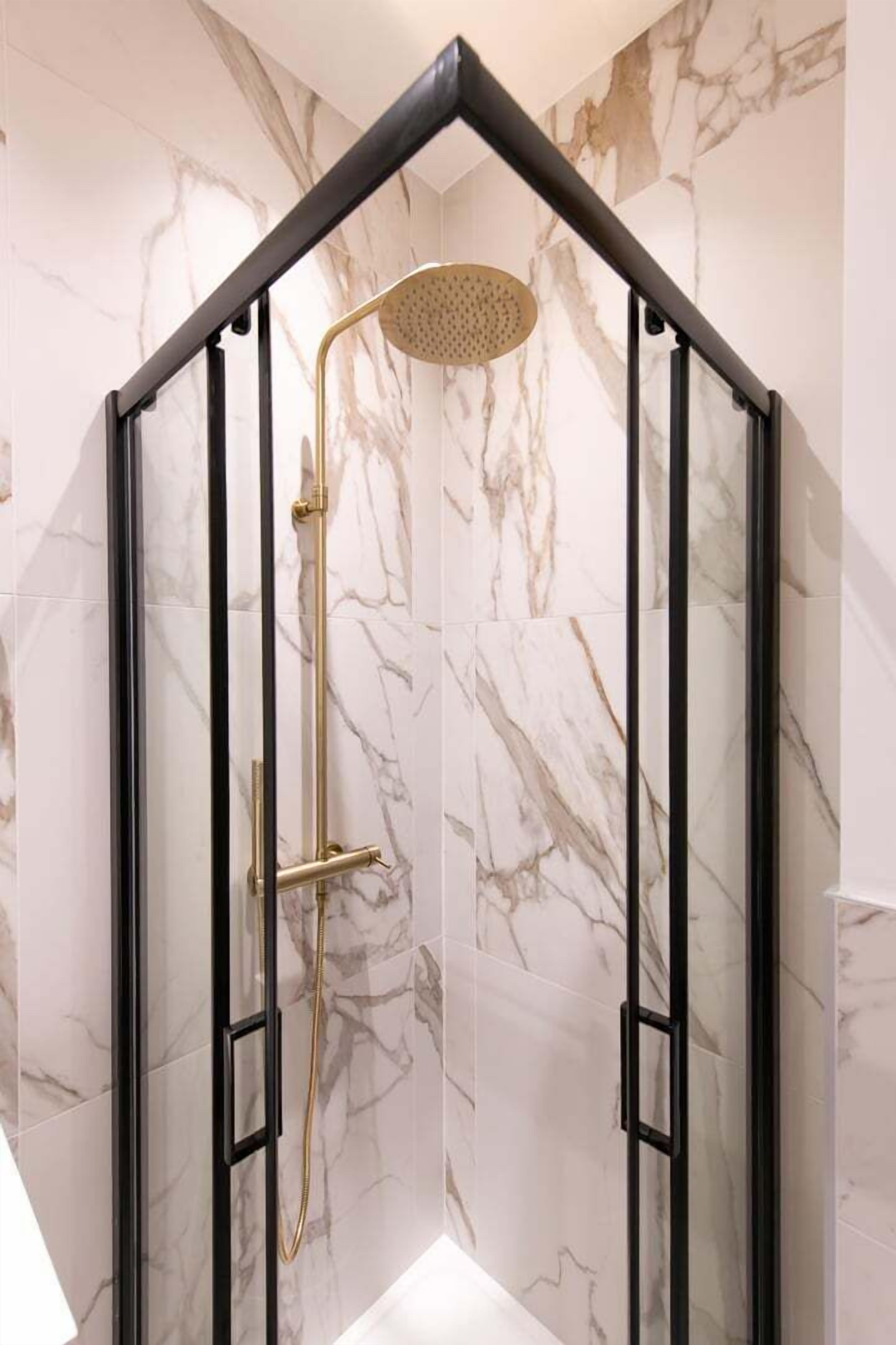 Shower, eco-friendly toiletries, hair dryer, towels