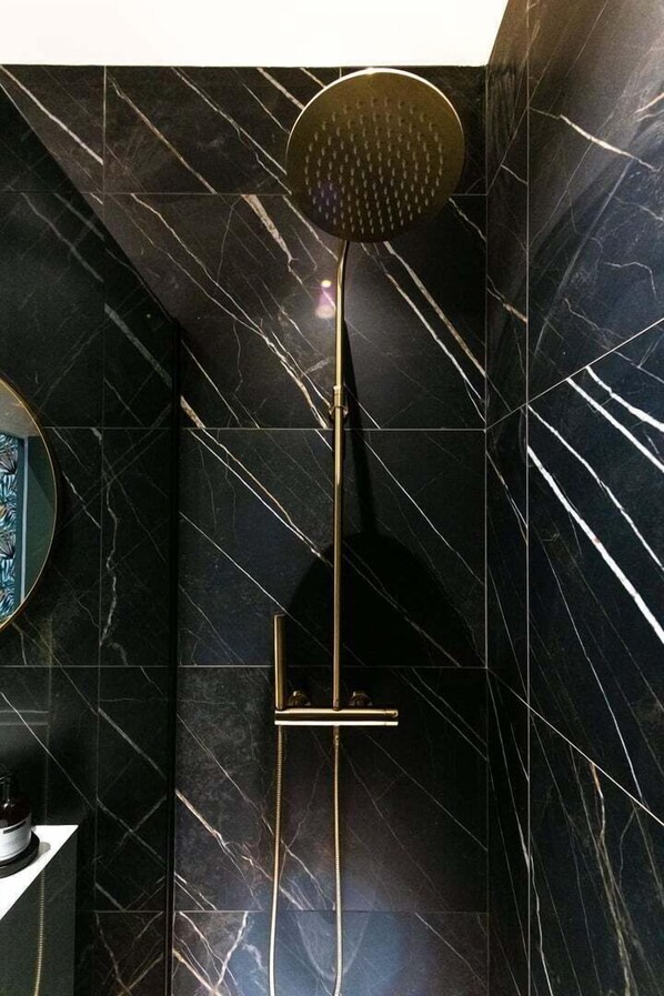 Shower, eco-friendly toiletries, hair dryer, towels