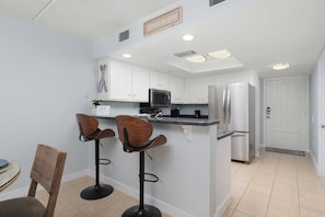 Fridge, microwave, oven, stovetop - Charming 2- bedroom, 1.5 bathroom steps away from the pristine sands of SPI, TX (South Padre Island)