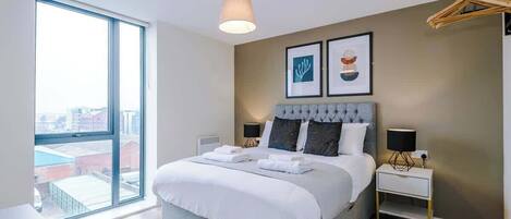 Fer et planche à repasser, lit parapluie, Wi-Fi, draps fournis