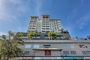 A multi-story building with a sign for Cairns Central Plaza. - Central Plaza: Adjacent Apartments w/ Rooftop Pool (Cairns)