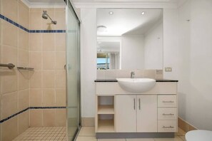 Shower, hair dryer, shampoo