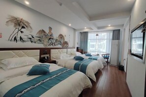 A hotel room with three beds, a large wall mural, and a balcony with a view. - Mengxiyuan Resort Hotel (Zhangjiajie)