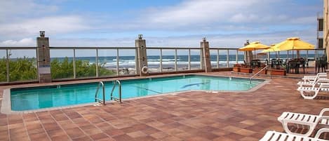 Outdoor pool, open 8:00 AM to 10:00 PM, pool umbrellas, pool loungers