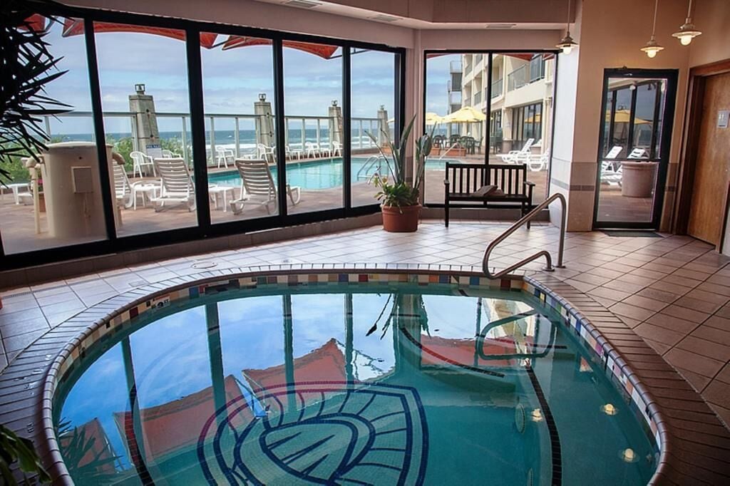 Outdoor pool, open 8:00 AM to 10:00 PM, pool umbrellas, sun loungers