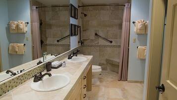 Combined shower/bathtub, hair dryer, towels, soap
