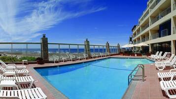 Outdoor pool, open 8:00 AM to 10:00 PM, pool umbrellas, pool loungers