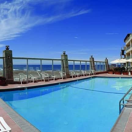 Outdoor pool, open 8:00 AM to 10:00 PM, pool umbrellas, sun loungers