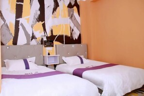 A hotel room with two beds, a headboard with a control panel, and a large abstract painting on the wall. - Colorful Art Hotel Shanghai (Shanghai)