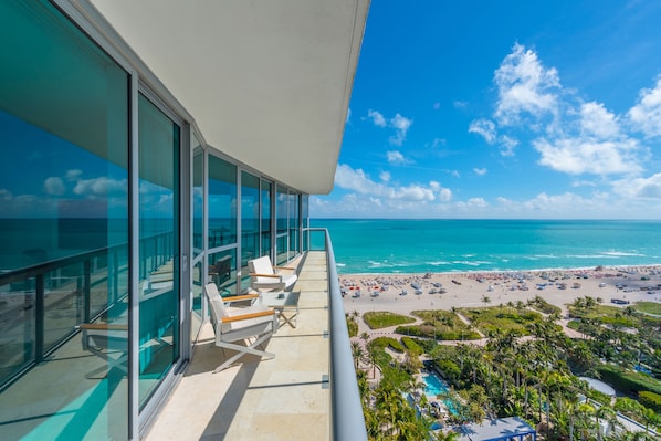 A balcony with a view of the beach and ocean. - The Setai Private Luxury Residences (Miami Beach)