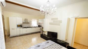 Departamento, vista al jardín | 2 habitaciones, cunas gratuitas, wifi gratis y ropa de cama