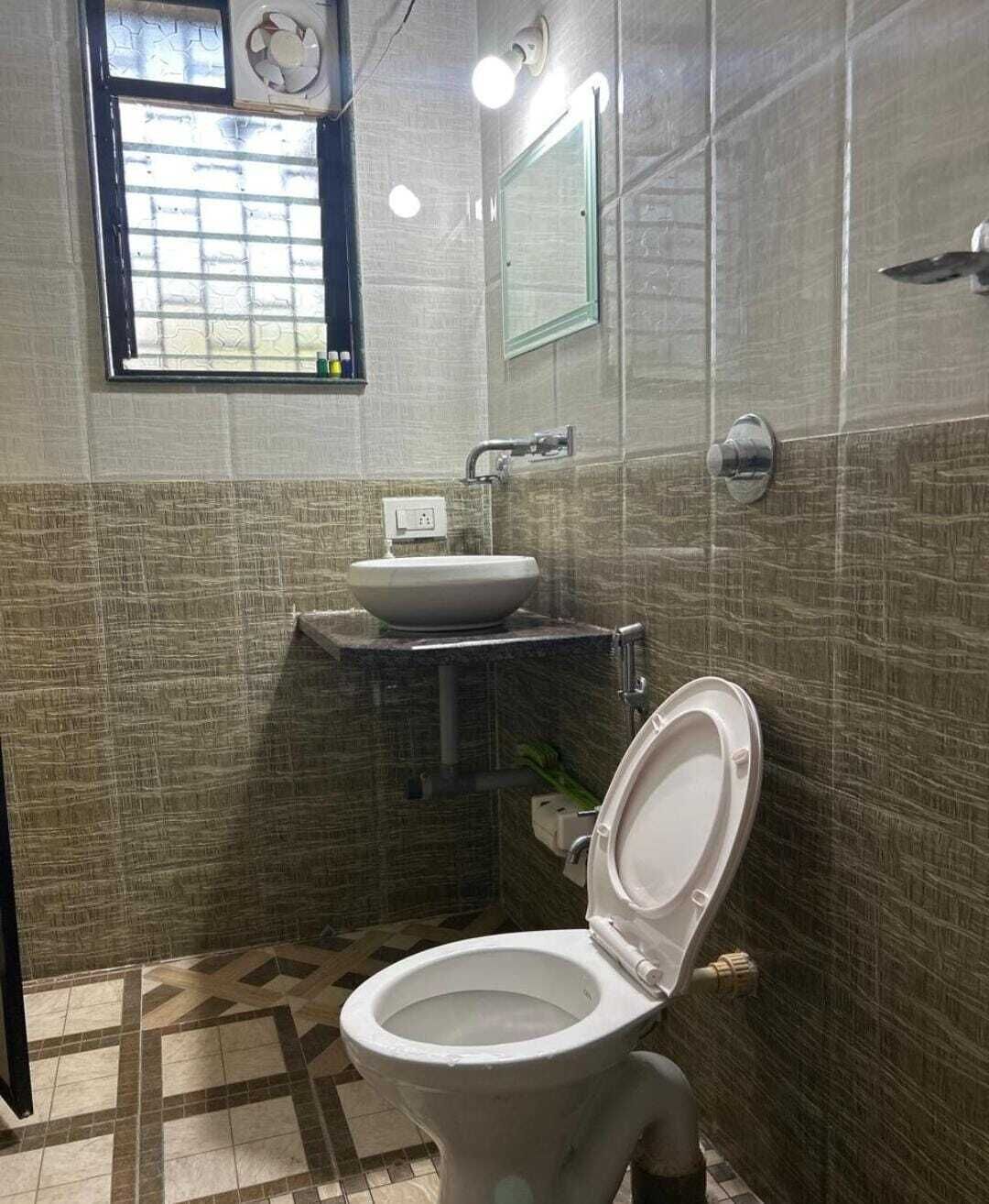 Economy Double Room, Balcony, City View | Bathroom | Shower, free toiletries, soap, shampoo