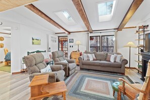 Smart TV, fireplace, books