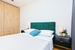 1 habitación, tabla de planchar con plancha, wifi gratis y ropa de cama