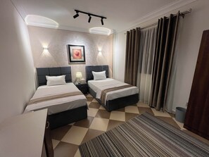 2 chambres, coffre-fort, fer et planche à repasser, Wi-Fi