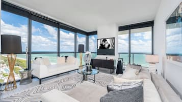 Luxury Suite, 3 Bedrooms, Kitchen, Ocean View | Living room | 55-inch flat-screen TV with cable channels