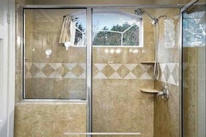 Shower, hair dryer, towels, soap