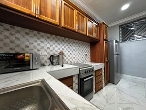 Fridge, microwave, oven, stovetop