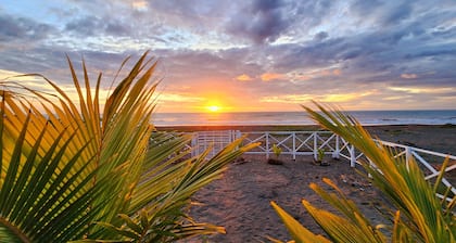 3-bedroom Beach and Garden Resort in Santa Cruz with WiFi, AC.TV Time to relax.