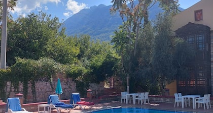 Evita Boutique Hotel – The Takeoff bus station for Paragliders