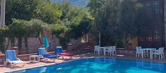 Evita Boutique Hotel – The Takeoff bus station for Paragliders