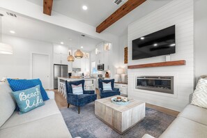 TV connectée, cheminée, table de tennis de table