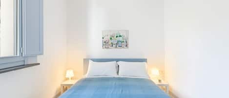 1 dormitori i roba de llit