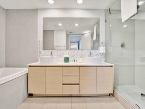 Shower, hair dryer, towels