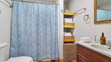 Hair dryer, towels, soap, shampoo