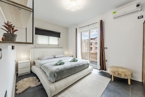 1 غرفة نوم ومكواة/لوح كي وواي فاي وملاءات أسرّة