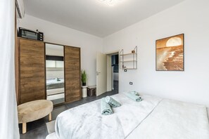 1 habitación, tabla de planchar con plancha, wifi y ropa de cama 
