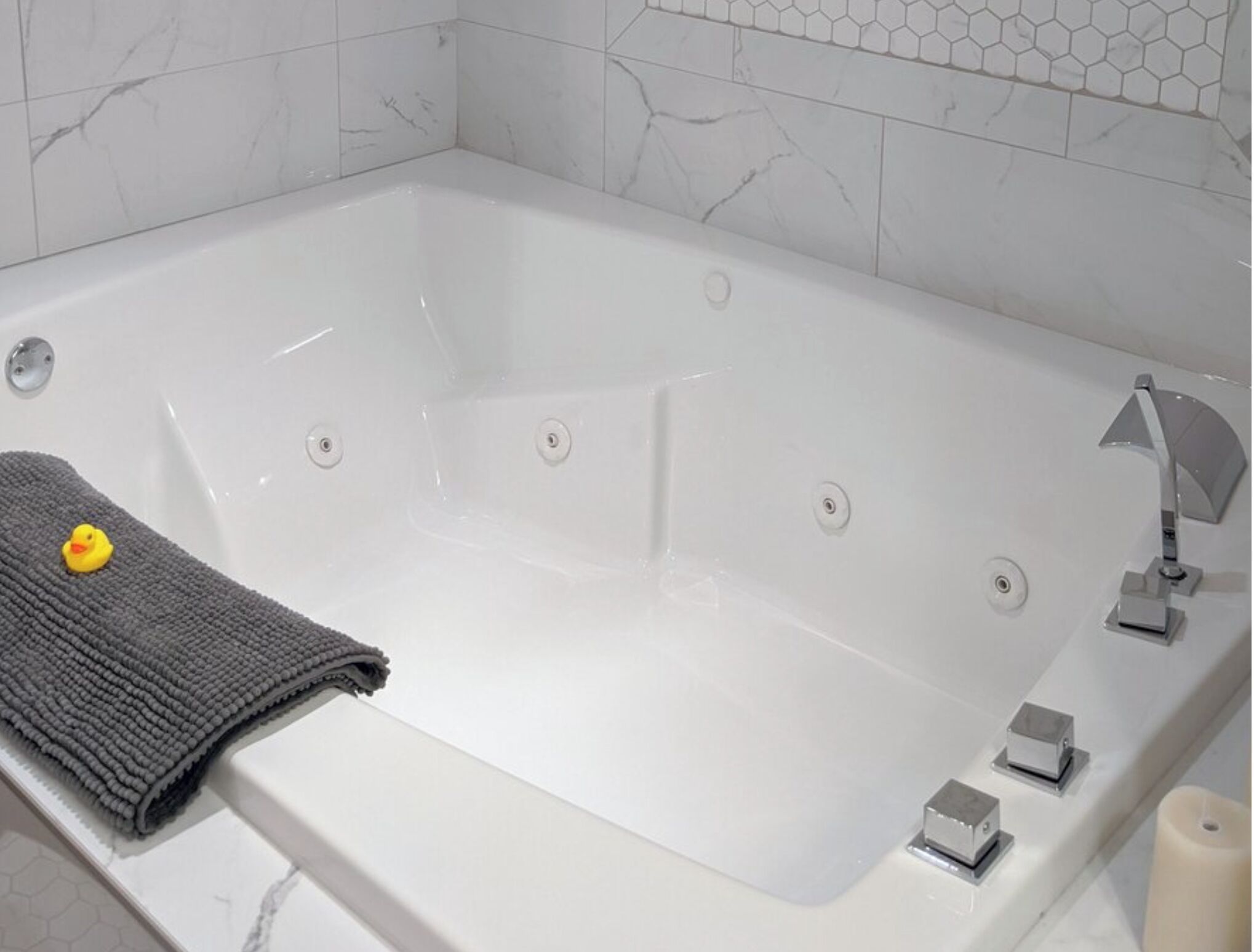 Jetted tub, eco-friendly toiletries, hair dryer, towels
