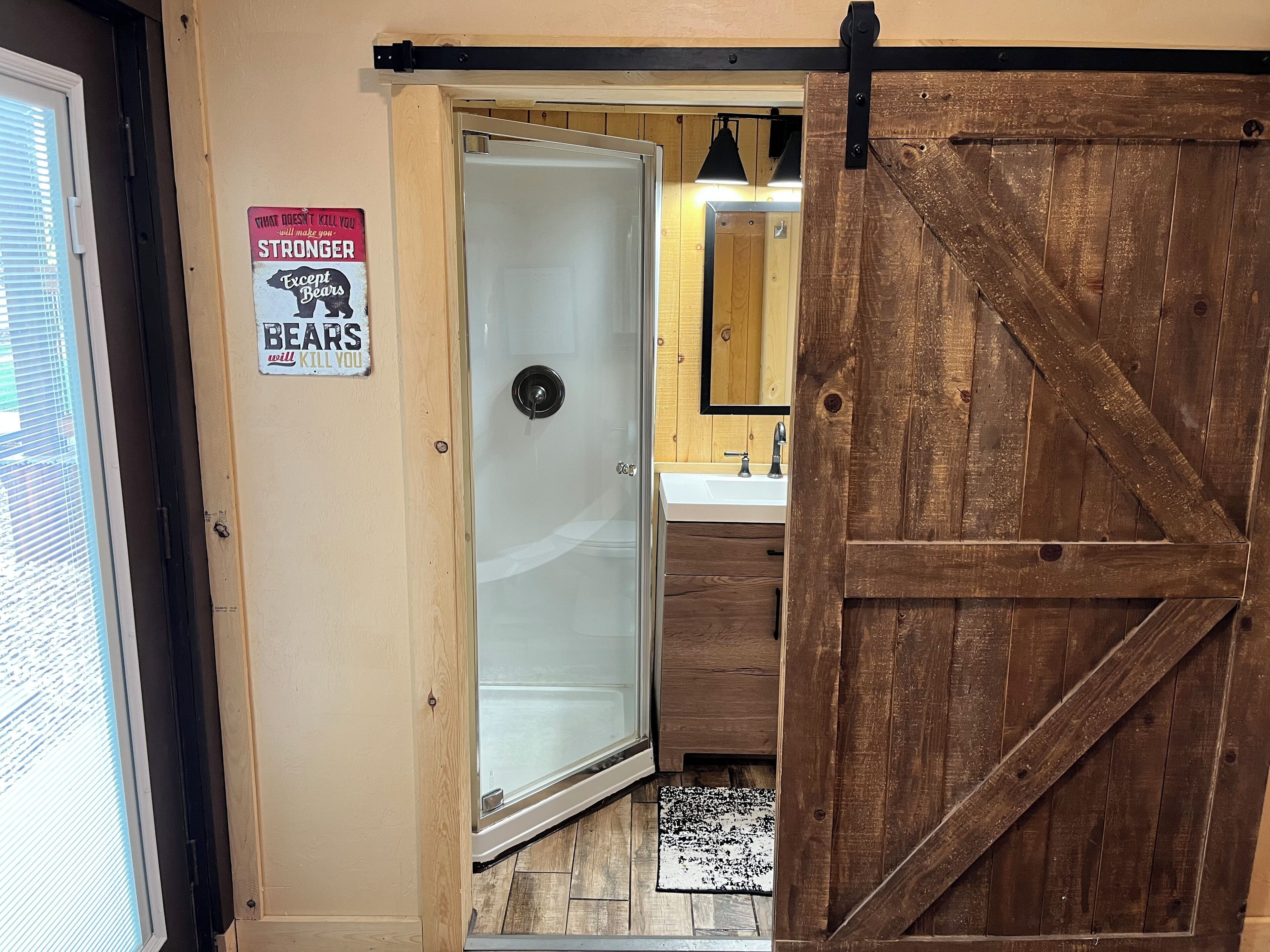 Shower, towels, soap, toilet paper