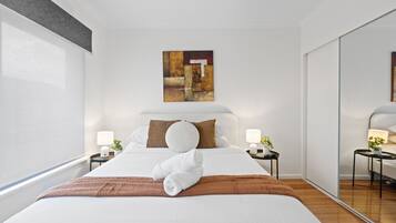 Iron/ironing board, travel crib, WiFi, bed sheets